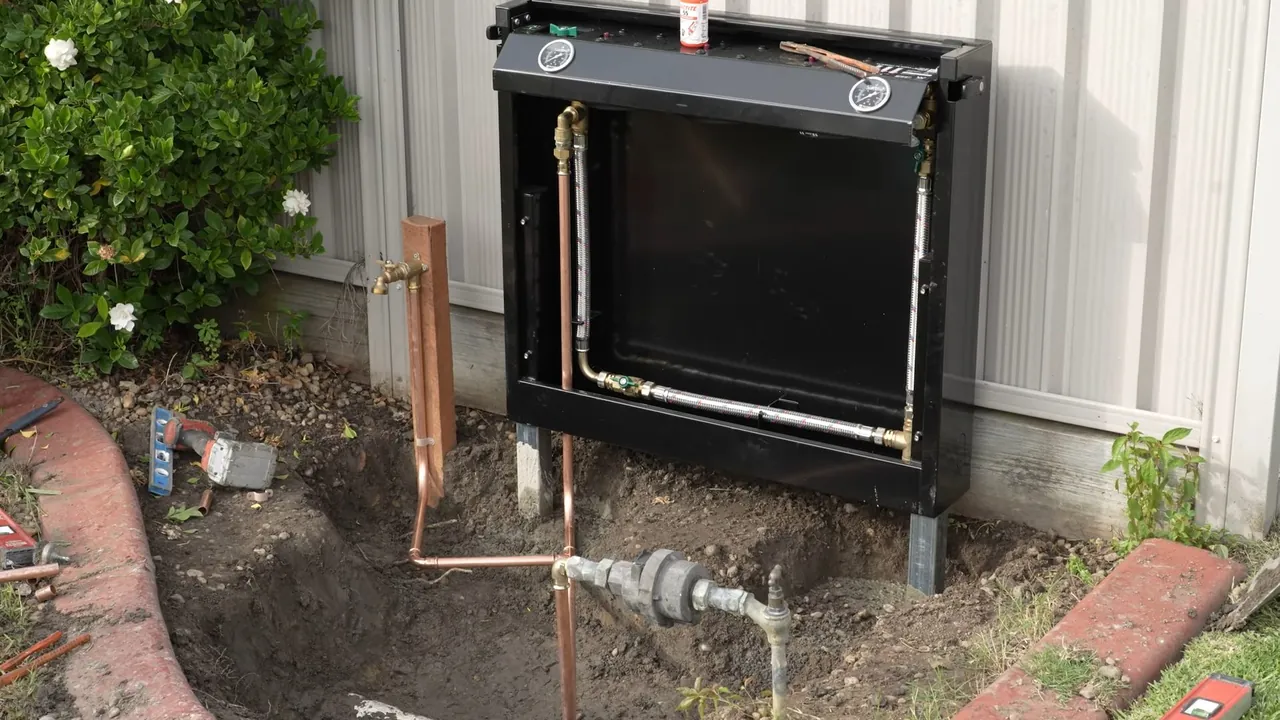 Outdoor whole-house filtration cabinet installed beside a Crown Hill area home
