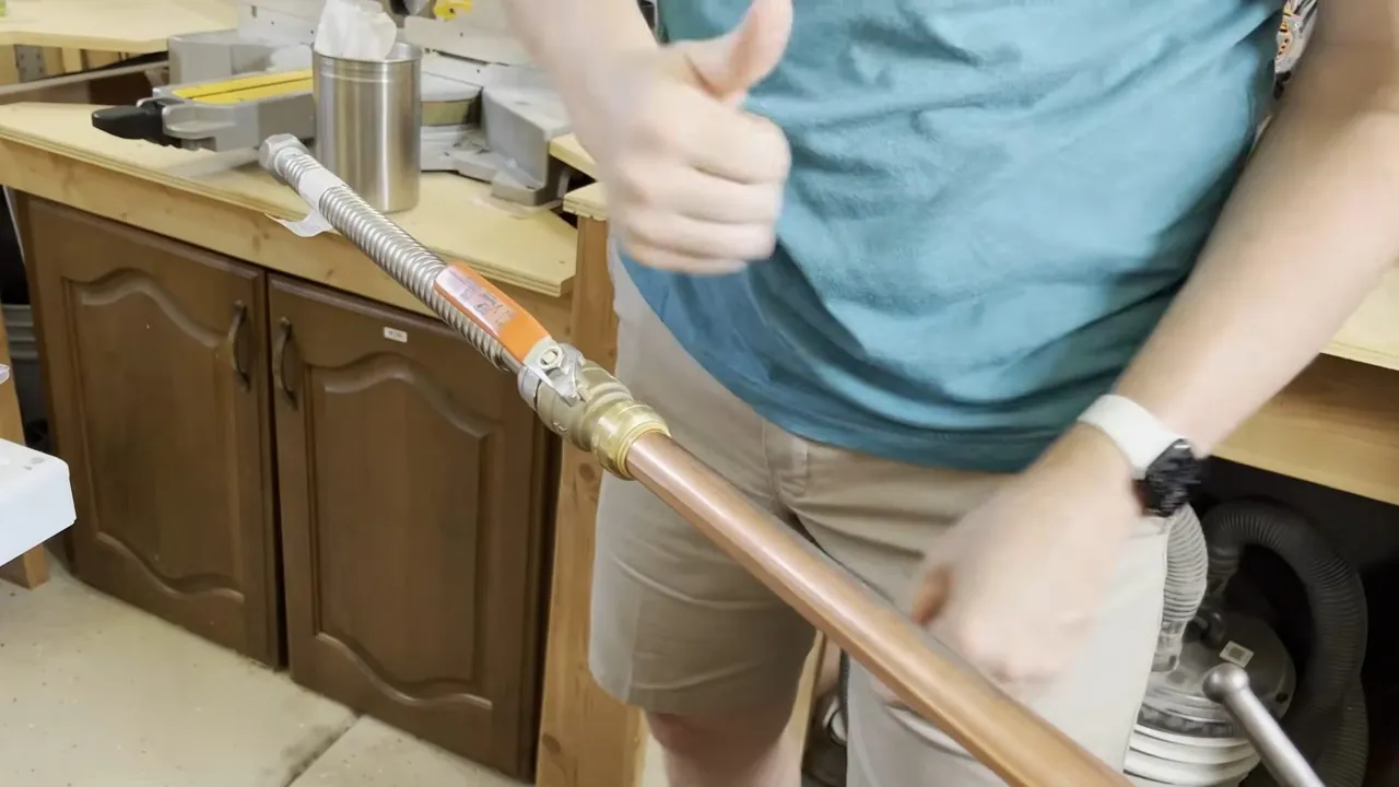 New copper supply line being installed through a Skyline Estates kitchen