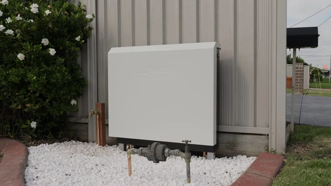 Whole-house filtration unit installed outside a Wheat Ridge Westside property